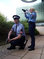 Leadmill (left) as Officer Simon & aliasdotcom (right) as Seras Victoria - both from Hellsing.  Photo by aliasdotcom