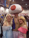 A very smug Toad with princesses Peach and Daisy from Mario Brothers